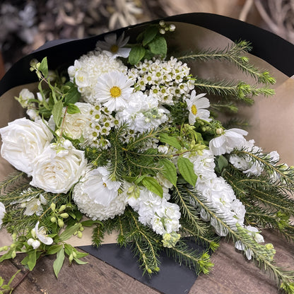 Textural white flower bouquet with roses, chrysanthemums and Australian natives